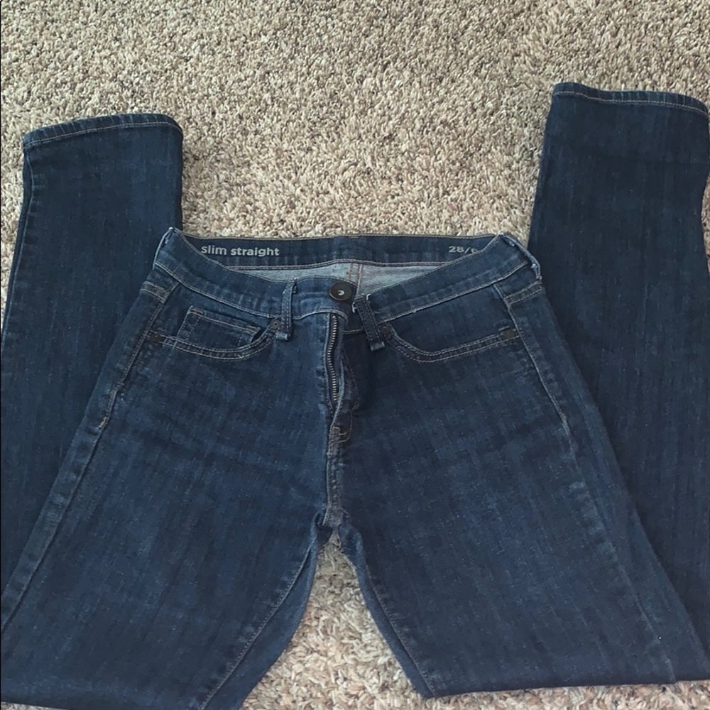 Straight legged blue jeans